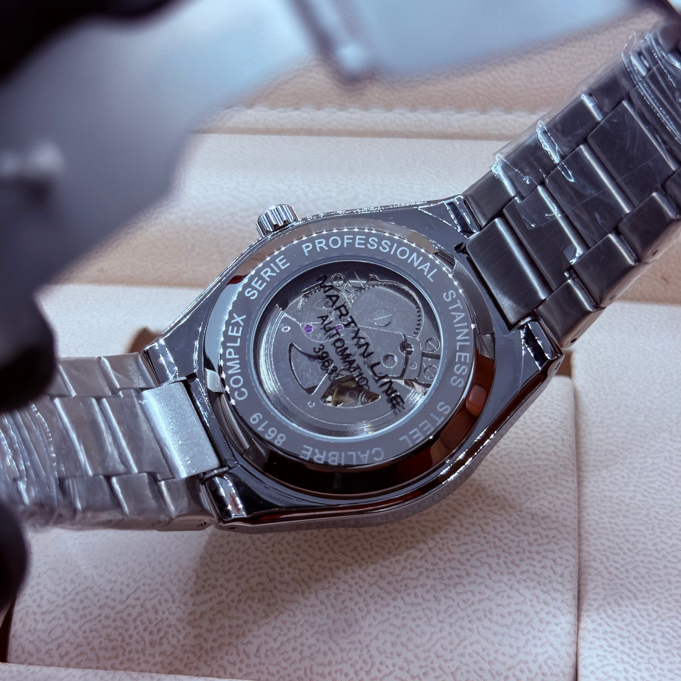 Automatic skeleton black dial with silver chain